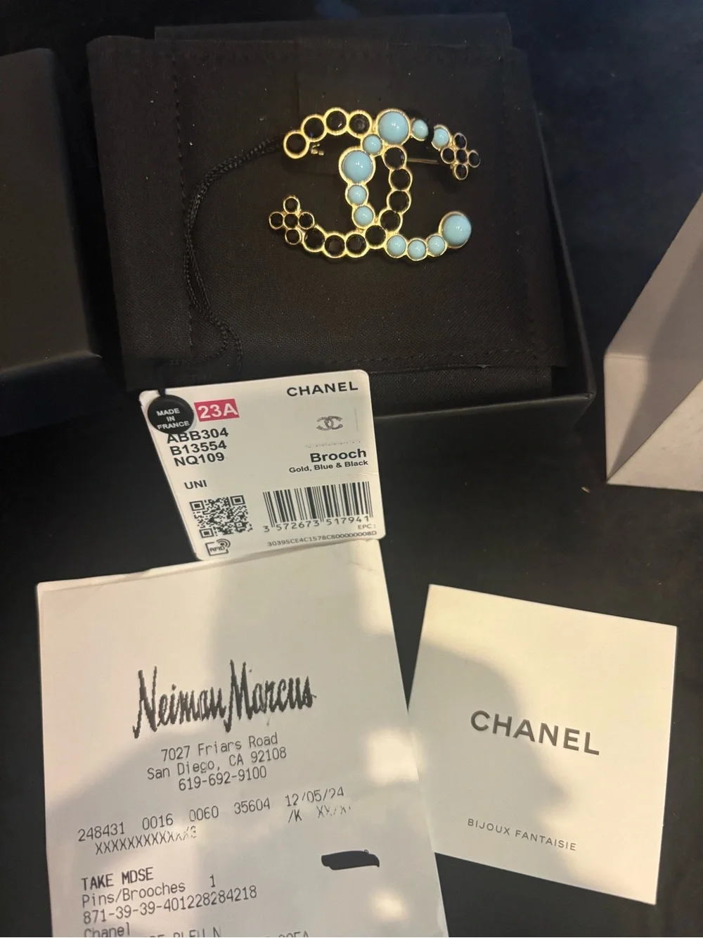 CHANEL Gold Brooch with Light Blue and Black Accents